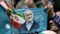 Iran faces runoff election between reformist and ultra-conservative presidential candidates amid record low turnout
